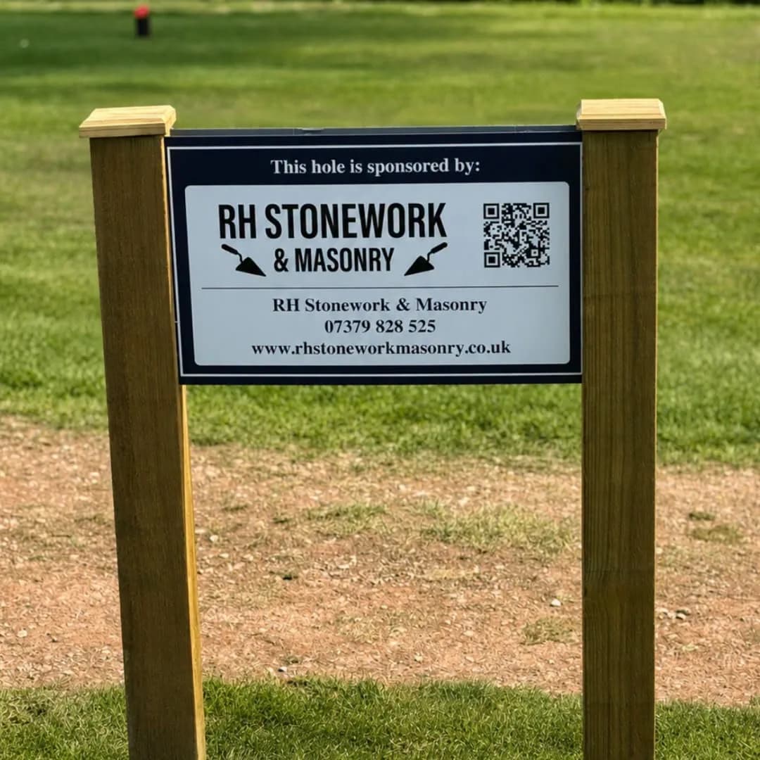The RH Stonework & Masonry sponsor's sign on the 13th hole at Monmouth Golf Club